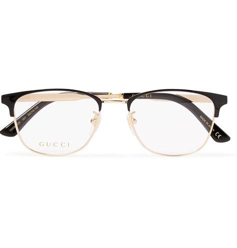 gucci eye frames black and gold